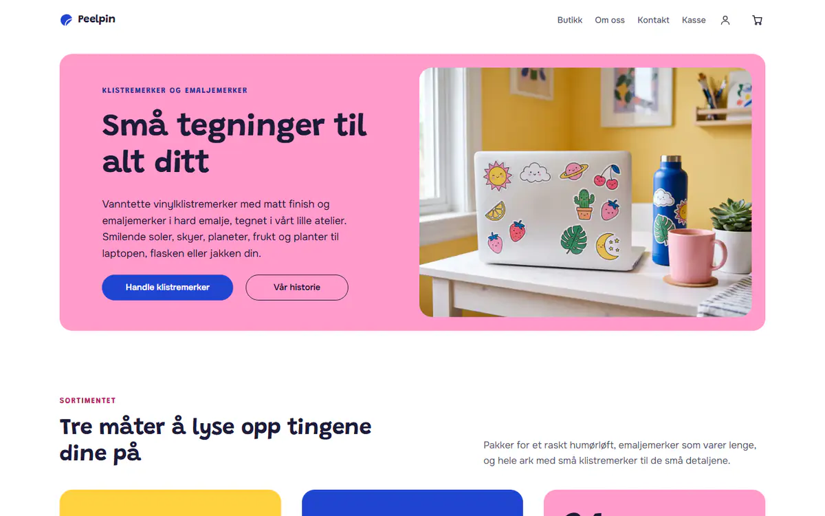Mal for butikk med klistremerker og pins, på datamaskin