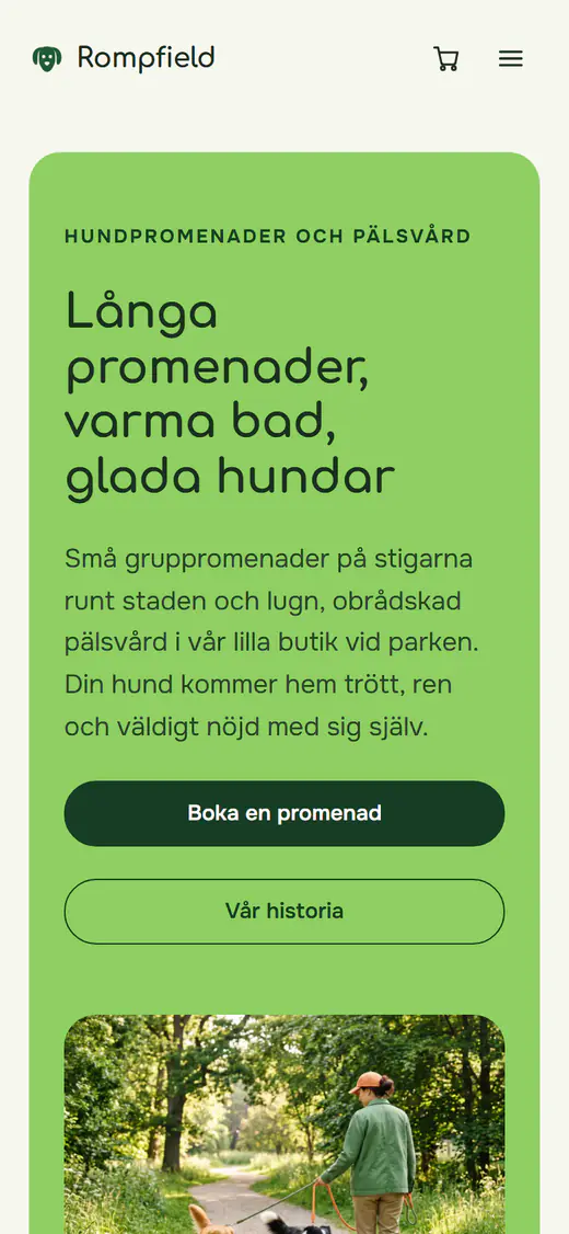 Webbplatsmall för hundpromenader och pälsvård, på en telefon