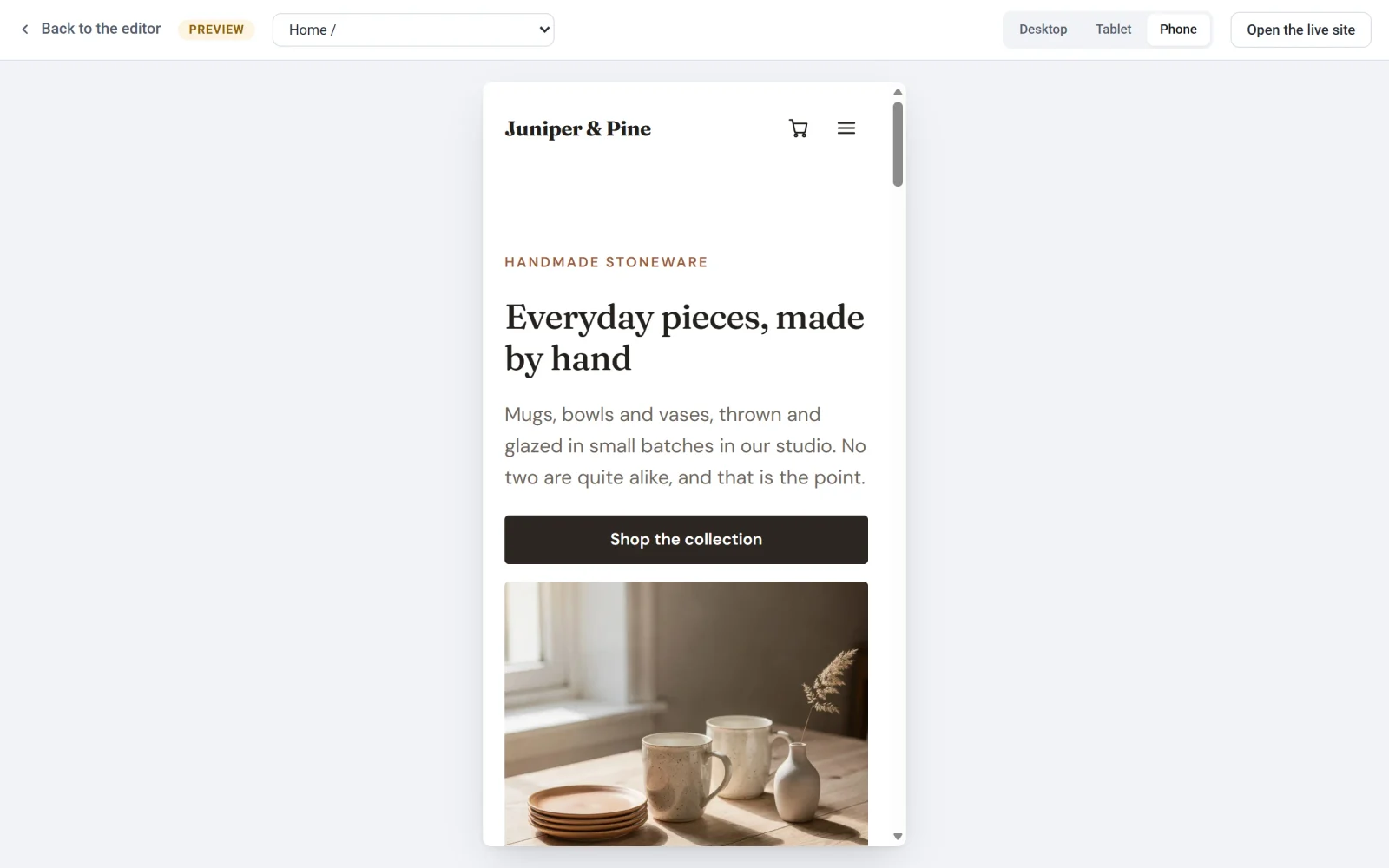 The preview narrowed to phone width, with the Phone button selected and the header showing a cart icon and a menu button