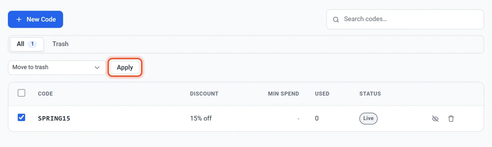 The Discounts list with one code ticked, Move to trash chosen in the Bulk actions menu and the Apply button highlighted
