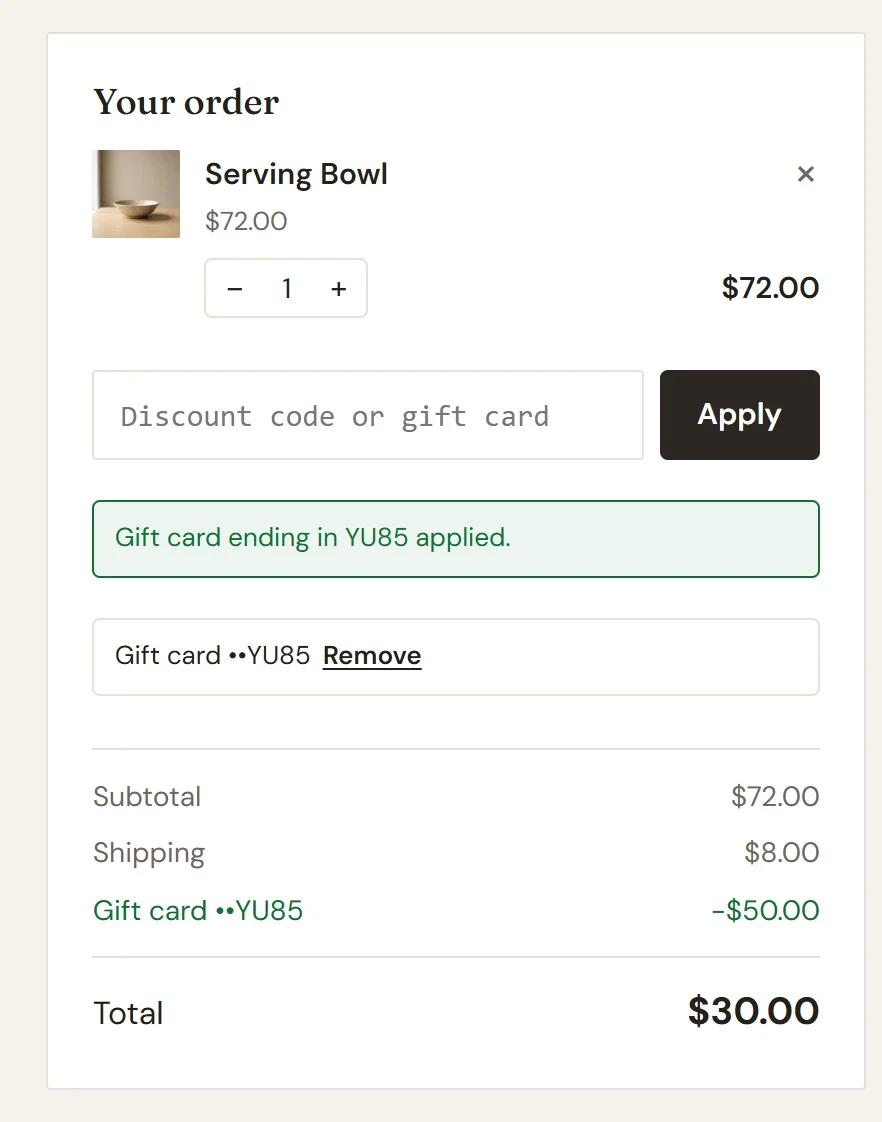 The Your order box at checkout with a gift card applied: Serving Bowl $72.00, Shipping $8.00, the gift card ending in YU85 taking off $50.00, and a Total of $30.00
