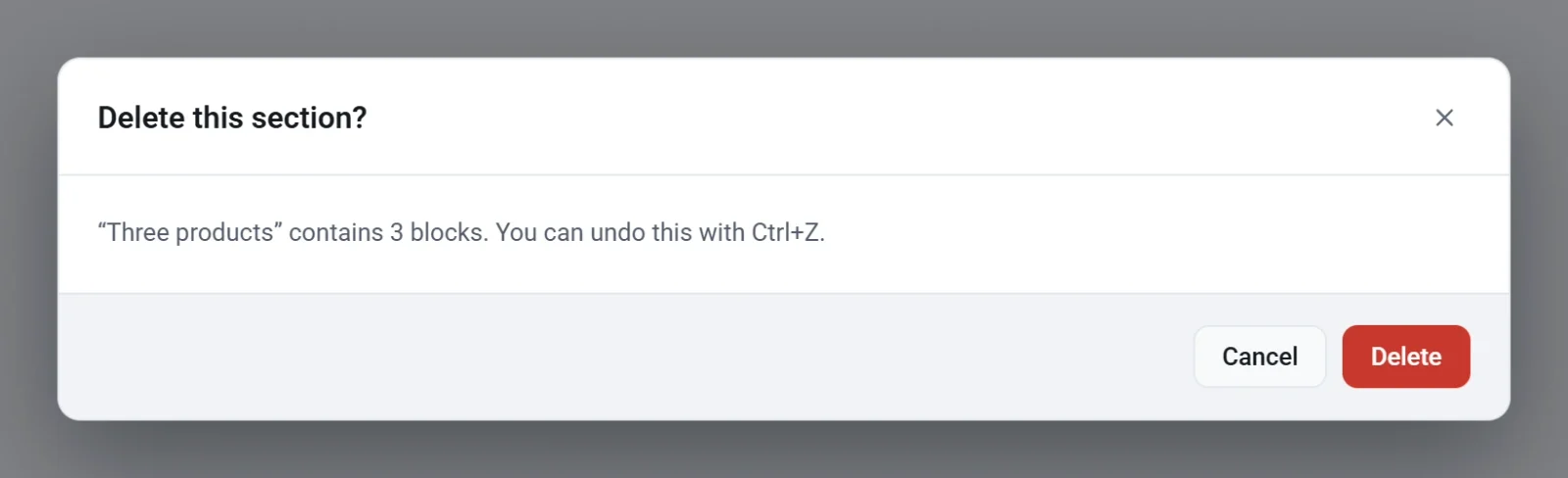 The Delete this section window, saying the section Three products contains 3 blocks, with Cancel and Delete buttons