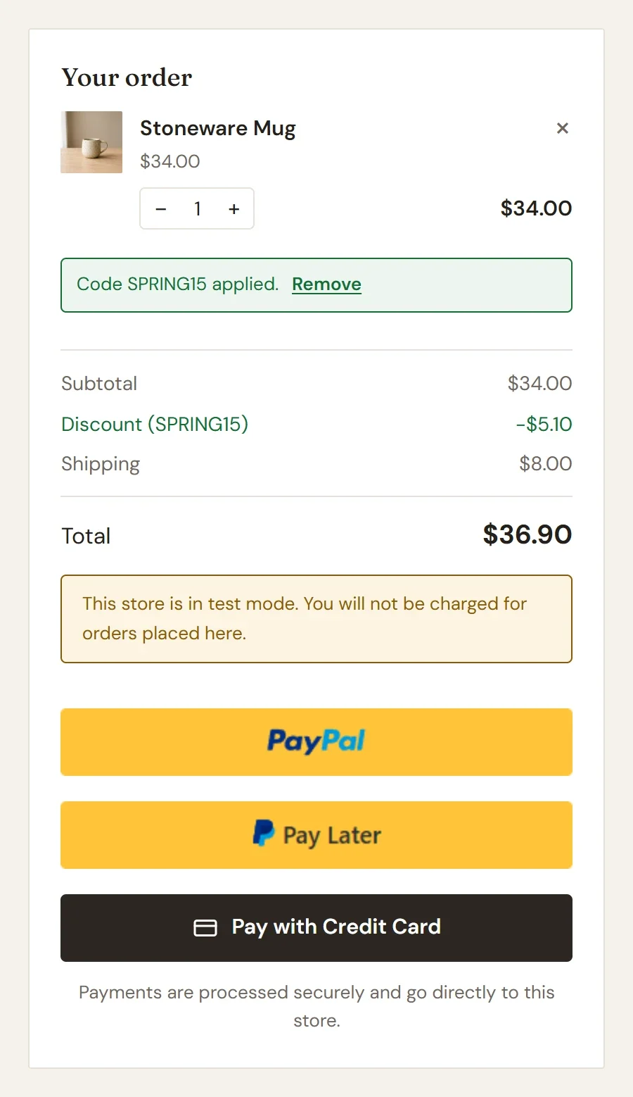 The order summary with the message Code SPRING15 applied, a discount line, a shipping line and the new total