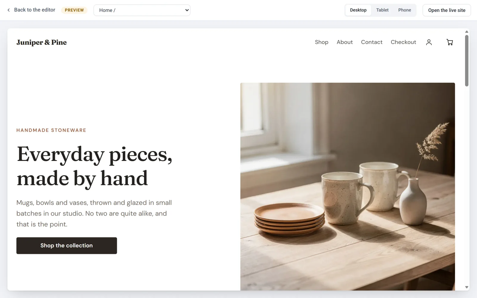 The preview of the Juniper and Pine home page at full width, with the Back to the editor link, a page list and the Desktop, Tablet and Phone buttons in the top bar