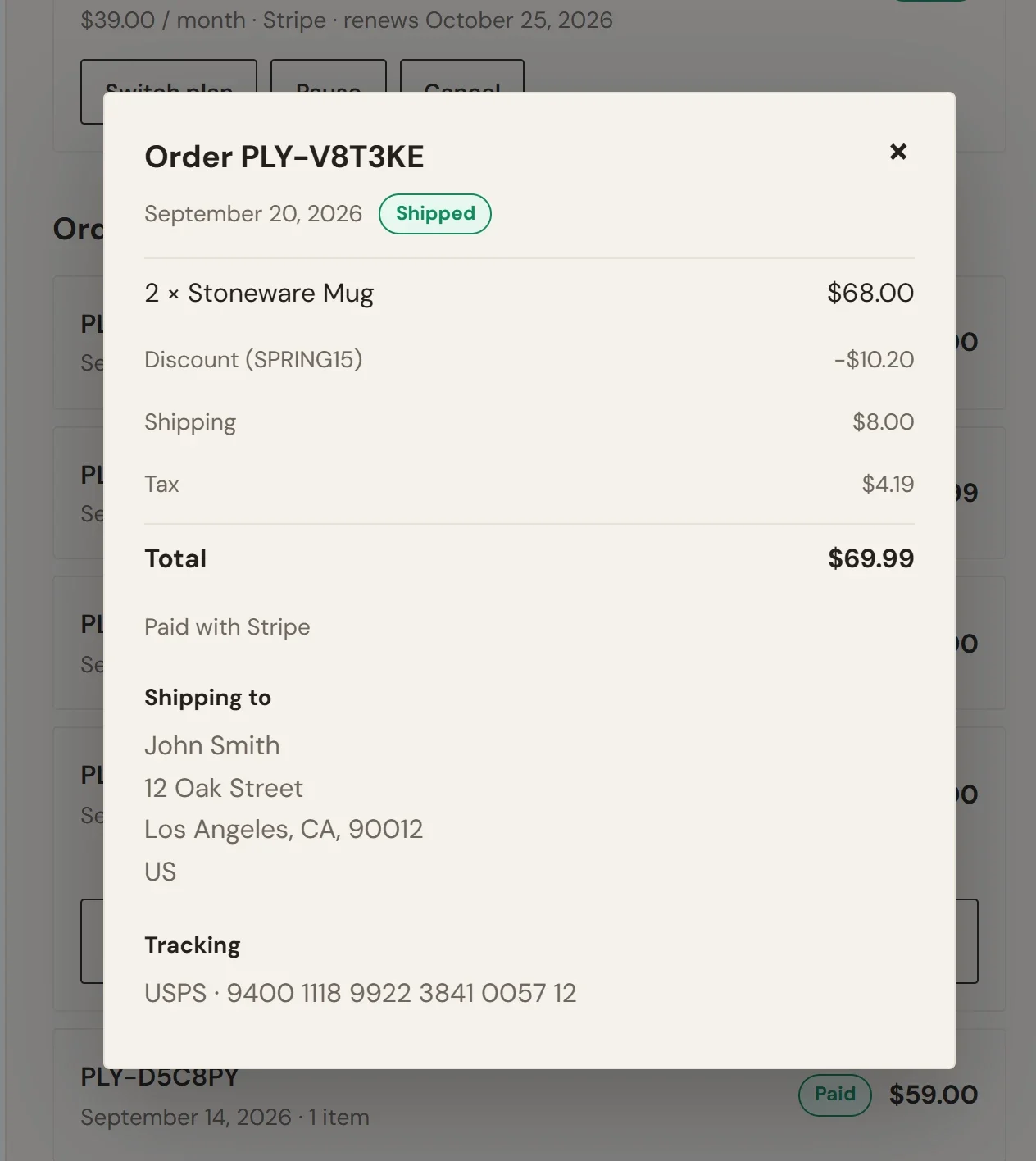 The receipt window for a shipped order of two Stoneware Mugs, with a discount line, shipping, tax and a total of $69.99, the payment method, the shipping address and a USPS tracking number