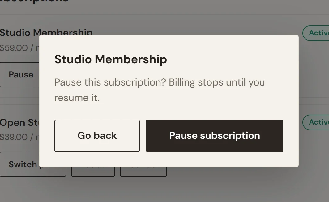 The confirmation box for the Studio Membership subscription, asking Pause this subscription, with the buttons Go back and Pause subscription